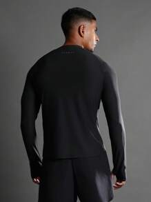 SUMWON Camiseta de entrenamiento de manga larga de alto rendimiento atlético con agujeros para los pulgares, ajuste de compresión, tela transpirable que absorbe la humedad para correr, ejercicio y fitness