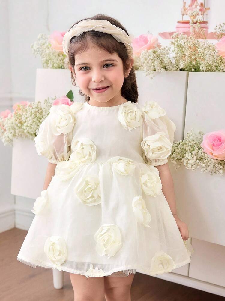 SHEIN 女婴3D立体花朵圆领泡泡袖修身连衣裙 女婴优雅连衣裙 米色女婴连衣裙 米色女婴连衣裙 带蝴蝶结的女婴连衣裙 - 杏色 - 查看 6
