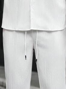 Manfinity CasualCool 男士休閒白色夏季度假兩件套，短袖鈕扣襯衫與長褲，純色單排扣套裝，極簡日常穿著正裝 - 白色 - 查看 6
