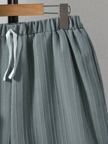 2pcs/Set Teen Boy Summer Casual Solid Color Textured Short Sleeve Shirt And Shorts Set