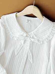 少女休闲校服白色长袖衬衫，翻领荷叶边装饰，纽扣前襟，纹理编织面料，纯白色，适合返校季和秋冬季穿着。 - 白色 - 查看 8