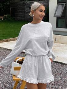 Livesso Damen Sommer Set aus locker sitzendem Sweatshirt und Shorts mit Rüschensaum, 2 Stücke