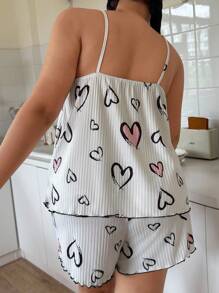 SHEIN Conjunto de pijama de camiseta de tirantes acanalada y pantalones cortos con estampado de corazones para mujeres de talla grande