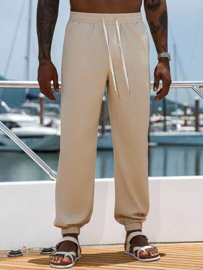 Manfinity Homme Men's Casual Versatile Solid Color Pants Beige Pants For Men Cream Joggers Men Men Drawstring Pants Elevate Your Holiday Style Vacation Essential