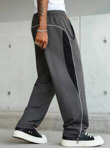 Manfinity Hypemode 男士休闲拼色抽绳腰宽松裤，侧条纹，拉链口袋设计，纯色长款宽松运动裤，送给丈夫、男朋友的理想礼物