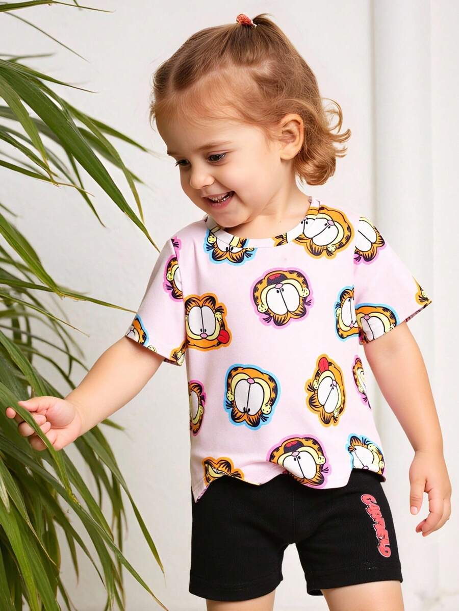 GARFIELD | SHEIN Bộ 2 áo phông in hình mèo hoạt hình dễ thương đáng yêu cho bé gái màu hồng và quần legging in chữ màu đen, phù hợp cho mùa xuân/hè, thể thao thường ngày và ngoài trời - Màu Hồng baby - Xem 1