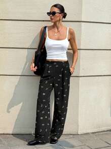 SHEIN Frenchy Vuelta al colegio para maestros - Pantalones casuales anchos con pliegues y bolsillo con estampado floral diminuto para mujer, perfectos para la oficina y salir, imprescindible del otoño - Pantalones estampados de invierno de uso diario en color negro - Negro - Ver 5