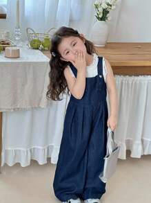 SHEIN Young Girl Deep Blue Denim Suspenders With A Three-Dimensional Bow On The Back,Kid Girls Spring And Summer Casual Vacation Country Boho Wear, Beach Outfits For Kid Girls,Western Street Wear For Girl,Spring Break Outfits,Rave Outfits Festival Denim Overalls,Young Girl Vacay Outfits