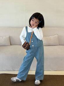 SHEIN Bộ 3 món cho bé gái mùa thu, gồm áo cổ tròn tay dài đơn giản, áo tank top dây đeo kiểu cao bồi thời trang và quần cao bồi may thủ công, thích hợp mặc hàng ngày như đi chơi và nghỉ mát mùa xuân và mùa thu. - Nhiều màu - Xem 7