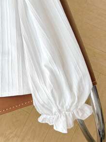 少女休闲校服白色长袖衬衫，翻领荷叶边装饰，纽扣前襟，纹理编织面料，纯白色，适合返校季和秋冬季穿着。 - 白色 - 查看 4