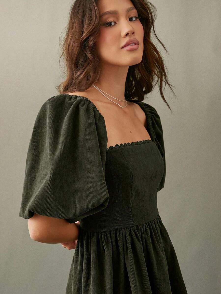 WESTFADE Đầm Babydoll tay bồng cổ vuông viền sò kẻ cao bồi nhung kẻ - màu xanh lá - Xem 1