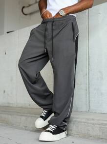 Manfinity Hypemode 男士休闲拼色抽绳腰宽松裤，侧条纹，拉链口袋设计，纯色长款宽松运动裤，送给丈夫、男朋友的理想礼物