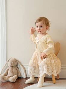 SHEIN The Baby Girl's Fashionable, Elegant And Sweet Apricot Strappy Jacquard Mesh Dress Pairs Well With A Long-Sleeved, Wavy Short Coat With A Bow, Making It Suitable For Daily Wear, Going To School, Attending Gatherings, And Outdoor Spring And Autumn - Apricot - View 5