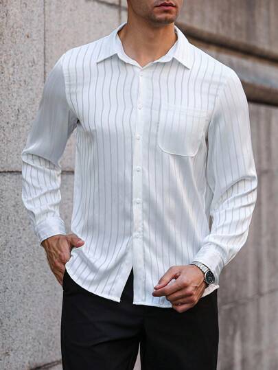 Manfinity Bizformal Camisa casual de manga larga de un solo pecho con bolsillo y corte holgado para hombre, camisa a rayas blanca para hombre