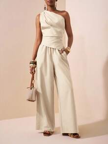 Zivah Conjunto de 2 piezas de top y pantalones rectos de mujer en color caqui, con un diseño de hombro asimétrico, cintura plisada y bajo asimétrico. Estilo elegante y versátil, adecuado para festivales de música, Pascua, Día de la Madre, bodas, fiestas de cumpleaños, uso diario y casual.