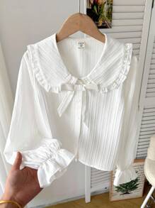 少女休闲校服白色长袖衬衫，翻领荷叶边装饰，纽扣前襟，纹理编织面料，纯白色，适合返校季和秋冬季穿着。 - 白色 - 查看 5