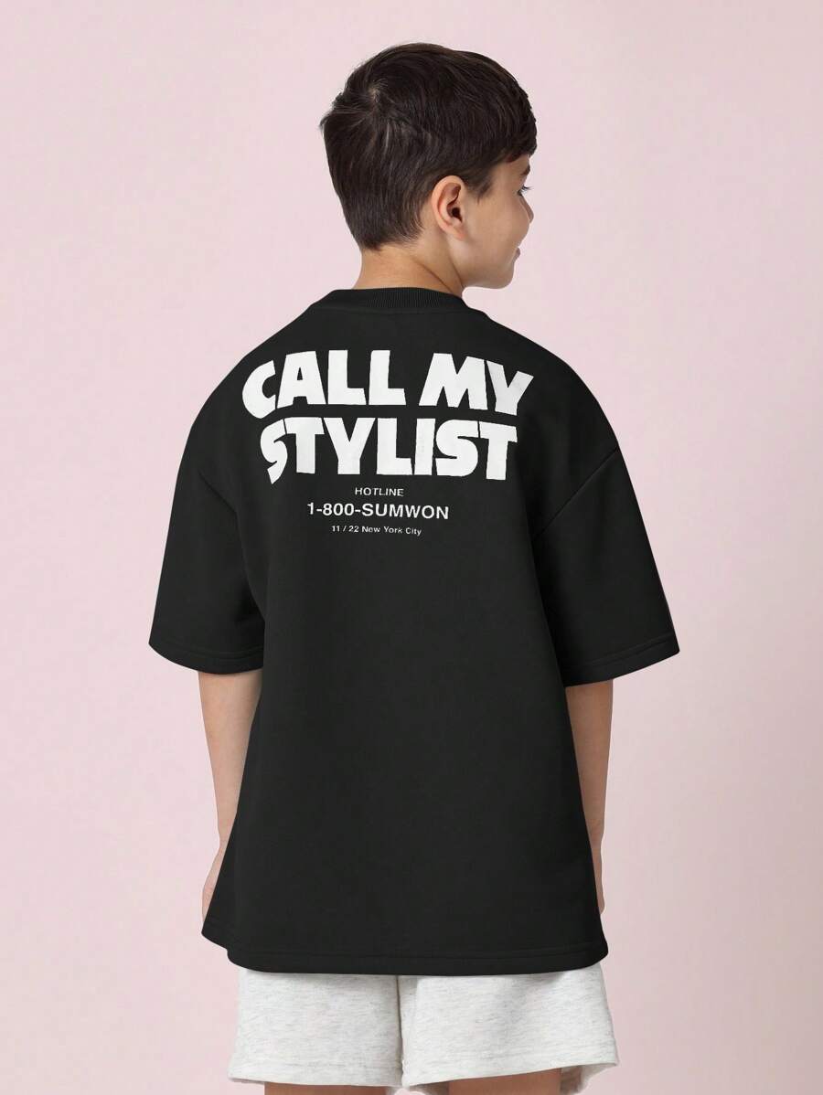 SUMWON T-shirt casual a maniche corte con grafica di , "Call My Stylist", collezione urban fashion, stampa sul retro con dettagli del numero di assistenza - nero - Visualizzare 1