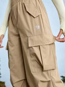 In My Nature Pantalones cargo para mujer con dobladillo con cordón