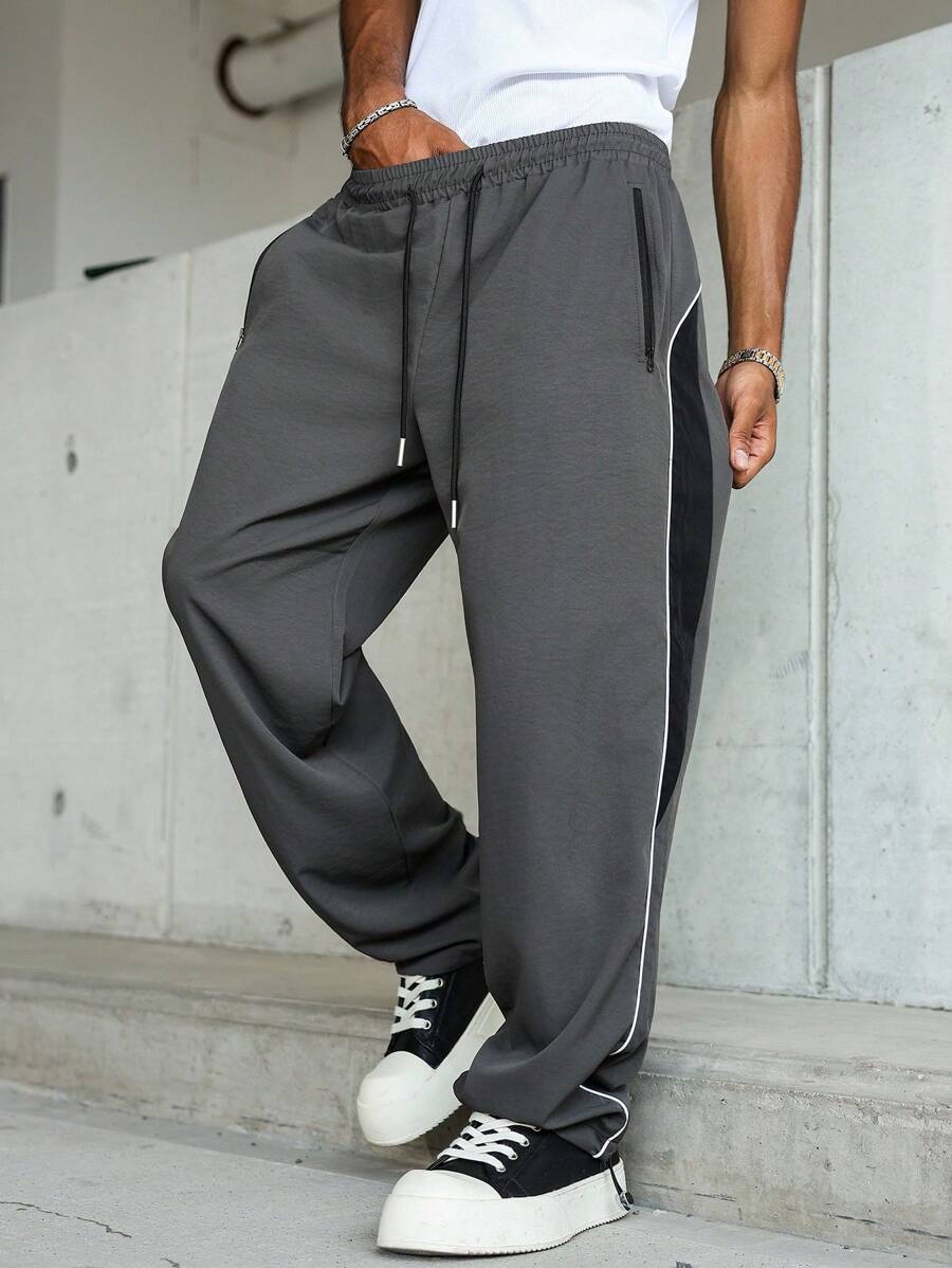 Manfinity Hypemode 男士休闲拼色抽绳腰宽松裤，侧条纹，拉链口袋设计，纯色长款宽松运动裤，送给丈夫、男朋友的理想礼物