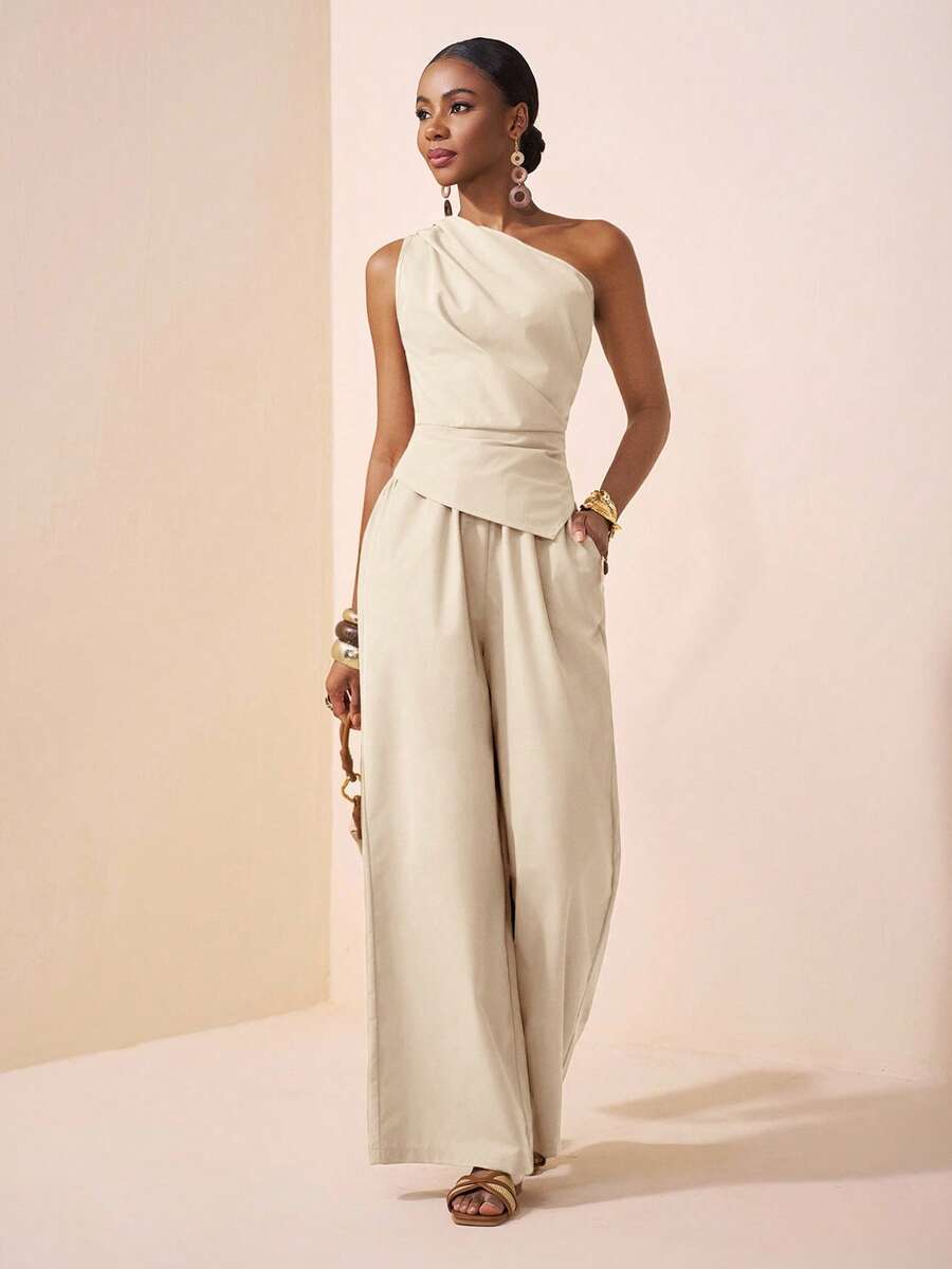 Zivah Conjunto de 2 piezas de top y pantalones rectos de mujer en color caqui, con un diseño de hombro asimétrico, cintura plisada y bajo asimétrico. Estilo elegante y versátil, adecuado para festivales de música, Pascua, Día de la Madre, bodas, fiestas de cumpleaños, uso diario y casual.