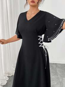 Modelyn Vestido plus size feminino de malha gradiente com decote em V e amarração lateral, corte A, adequado para passeios e encontros no outono - Preto - Ver 1