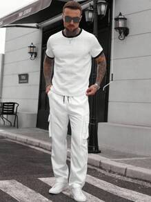 Manfinity CasualCool Pantaloni cargo casual da uomo di colore bianco, pantaloni cargo bianchi da uomo, pantaloni jogger bianchi da uomo. Pantaloni casual da uomo con vita con coulisse e gamba dritta, tasche laterali, tinta unita, adatti per l'autunno e le vacanze - Bianco - Visualizzare 3