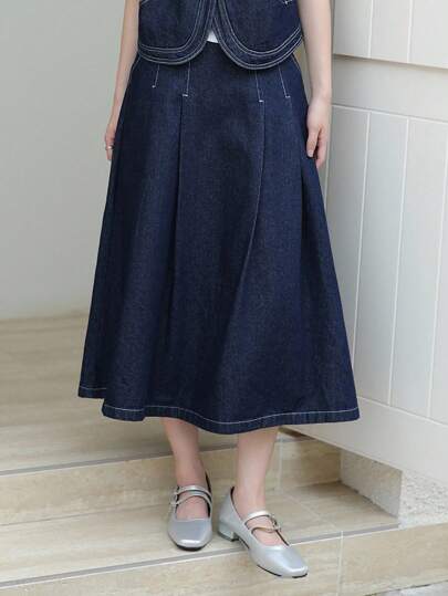 K-Vae Women's Casual Long Dark Wash Denim Skirt. This Stylish A-Line Blue Midi Skirt Features Practical Pockets, Offering Effortless Comfort And Versatile Everyday Wear For Teens And Adults.