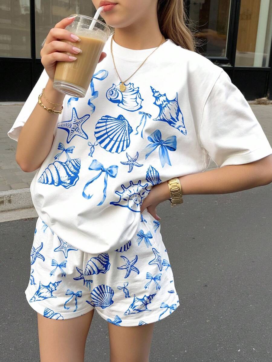 Emery Rose Kids Emery Rose Kids 2 件套可爱海洋生物、贝壳、蝴蝶结印花休闲短袖上衣和短裤套装，适合夏季、夏季度假、度假氛围、古代花卉、日落粉彩、清凉 - 彩色 - 查看 1