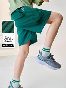 JNSQ Vêtements de rentrée scolaire, shorts décontractés amples pour préadolescentes et garçons, shorts décontractés amples avec poches et taille élastique pour enfants - Vert sapin - Voir 1
