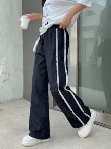 SHEIN Quần dài thường ngày dệt trơn màu chắp vá hai lớp nhún bèo cho bé gái tuổi teen - màu đen - Xem 1