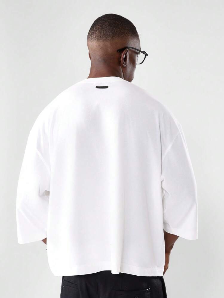 Essential – Kastenförmiges T-Shirt mit Dreiviertelärmeln und minimalistischem Design