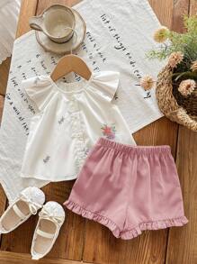 SHEIN LMoss Kids 新生女宝宝花卉刺绣图案短袖上衣和绿色短裤套装，夏季女宝宝服装，夏季套装，女宝宝荷叶边短裤套装，两件套，女宝宝夏季服装，女宝宝花卉短裤套装，女宝宝复古风格套装 - 彩色 - 查看 5