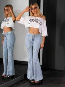 Jeanoix Jeans évasés à taille basse avec ourlet effiloché dans un style de rue décontructuré