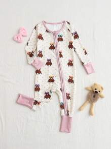 Dziewczęcy kombinezon piżamowy z długim rękawem i nadrukiem w kokardę z kreskówki i misiem, dopasowany do ciała, zapinany na zamek