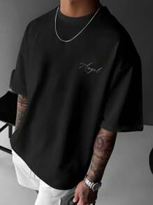 Manfinity EMRG Men's Avant-Garde Black Graphic Tee Featuring A Striking Female Deity Angel Print. This Street Casual Round Neck Short Sleeve Knitted T-Shirt Offers A Bold Statement Piece For Modern Styling. - Black - View 2