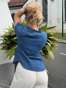 Jeta Ari 捲起袖口的扣前牛仔襯衫