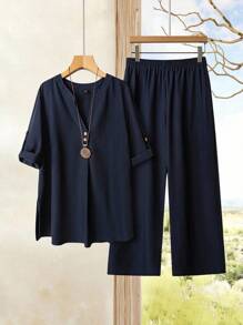 EMERY ROSE Plus Size Women's Summer Solid Color Notched V-Neck Rolled Sleeve Shirt And Wide Leg Pants Loose Casual Two-Piece Set - Navy Blue - View 1