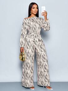 SOLERSUN 女式全印花不对称领口长款蝙蝠袖系带前阔腿连体裤，适合约会、工作、度假、节假日、休闲装、夏季波西米亚风格/假日/节日/音乐节/德比连衣裙，适合度假和日常穿着（随机花卉） - 杏色 - 查看 1