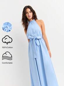 Nöista Light Blue Halter-Neck Maxi Dress With A Fitted Waist And Bow Belt. Flowing A-Line Silhouette. Back Features A Dramatic Ruffled Design And Open Detailing. . Elegant, Feminine, Chic, Airy, Sophisticated, Stylish, Comfortable, Versatile, Perfect For Summer Events And Evenings. - Blue - View 1