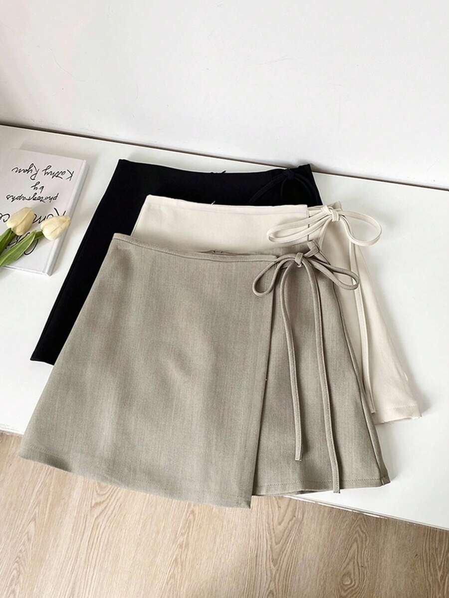SHEIN PETITE Franclia Fashion Casual Versatile Side Strap Asymmetrical Hem Spring And Summer Khaki Textured Woven Material Women's Short Skirt Women's Skirt Women's Summer Wear Summer Bottoms Women's Skirt Women's Short Skirt Mini Skirt Petite Clothing Women's Casual Clothing All White Casual Outfits Spring - Khaki - View 1