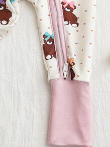 Dziewczęcy kombinezon piżamowy z długim rękawem i nadrukiem w kokardę z kreskówki i misiem, dopasowany do ciała, zapinany na zamek