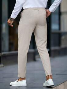 Calvornis 男士商务休闲纯色锥形正装裤，整体采用经典黑色，散发着稳重端庄的商务气息。适合日常通勤、商务、聚会和宴会。这款裤子是男士衣橱中不可或缺的百搭单品，也是送给男朋友或老公的绝佳礼物。 - 杏色 - 查看 2