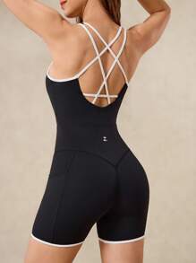 OutZeal Mono deportivo para mujer con control de abdomen, tela suave y fresca, con tirantes cruzados, para ciclismo, entrenamiento y gimnasio