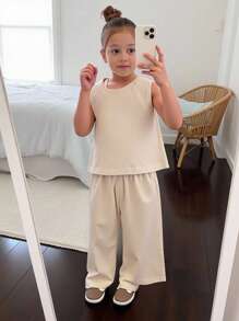 2pcs/Set Young Girl Woven Solid Color Jacquard Ruffle Hem Blouse And Loose Casual Pants