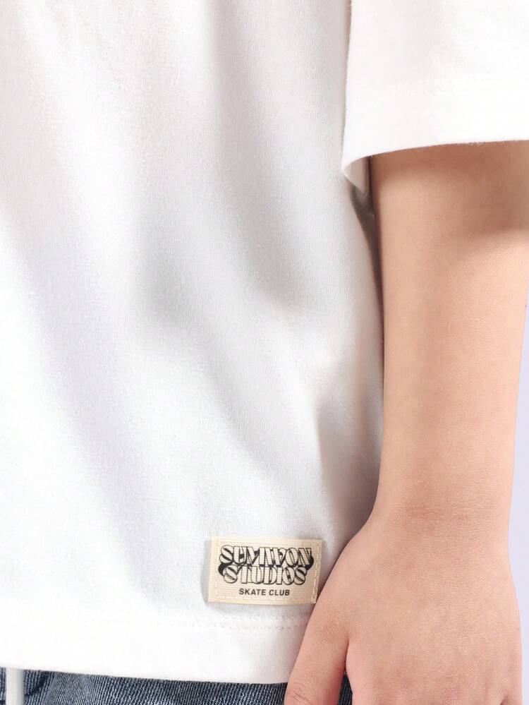 T-shirt oversize in cotone con design a spalla scesa