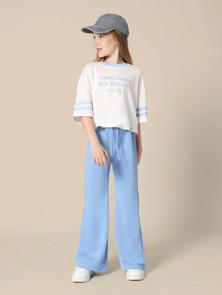 Boxy T-Shirt With Varsity Text And Flared Joggers