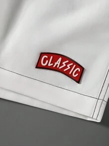 Manfinity EMRG Quần short nam dáng rộng, cạp chun, in chữ, quần short thường ngày, quần short oversize, quần short hàng hóa màu trắng cho nam - trắng - Xem 4