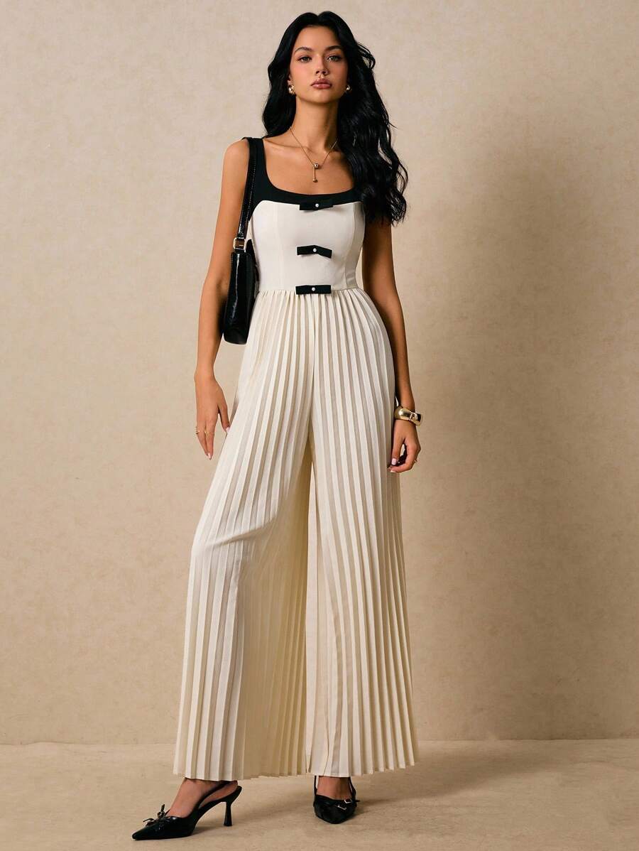 Poéselle Damen Jumpsuit mit Schleifendekor und weitem Bein - Schwarz und Weiss - Übersicht 1