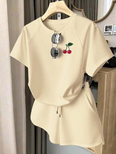 INAWLY Conjunto casual de 2 piezas de camiseta de manga corta tipo raglan y shorts con estampado de cerezas para mujer, de verano