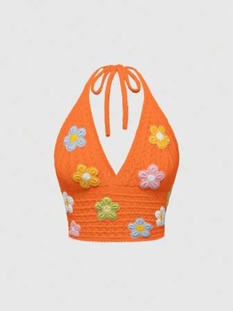 Top da vacanza con collo a canotta e motivo floreale all'uncinetto